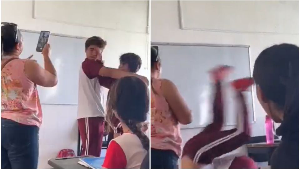 Durante el conflicto, la maestra que se encontraba en el salón únicamente graba la situación y no es hasta que la chica vuelta a caer al suelo, que interviene.