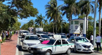 Taxistas de Cancún desquician zona hotelera; EU alerta a sus ciudadanos