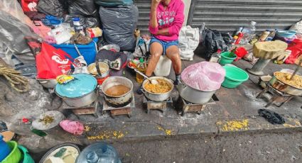 Migrantes cocinan y duermen en condiciones insalubres en calles de la colonia Juárez