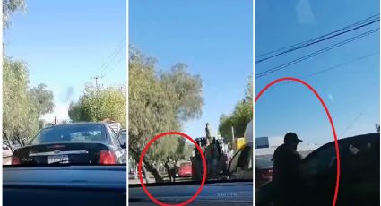Conductor se molesta por claxon y rompe cristales de auto en bulevar de Pachuca | VIDEO