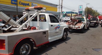 Bloqueo en Tlalnepantla; operadores de grúas denuncian irregularidades en FGR