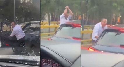 VIDEO: Con golpes y groserías, conductor daña automóvil en Río Churubusco