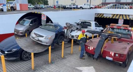Sacan 80 autos tras inundación en estacionamiento de Plaza Ánimas de Xalapa