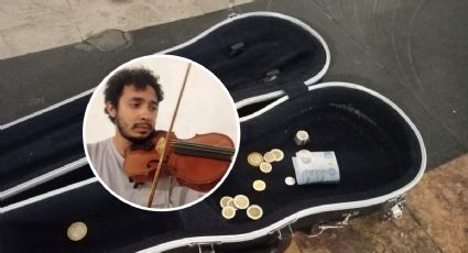 Arturo toca su violín en calles de Veracruz y sueña con llegar a Argentina