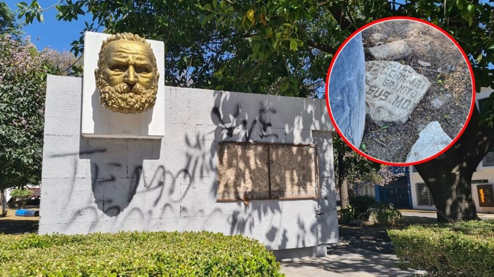 La pared rectangular que sostiene el rostro en relieve del escritor  Víctor Hugo está grafiteada y semidestruida