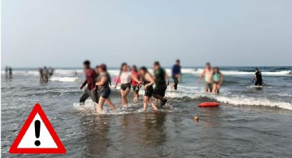 Rescatan a turistas en playa de Chachalacas; fueron arrastrados mar adentro