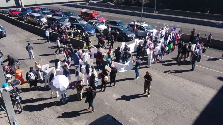 Bloqueo en Periférico Norte en demanda de la localización de Kymberly, 9 horas y se mantiene