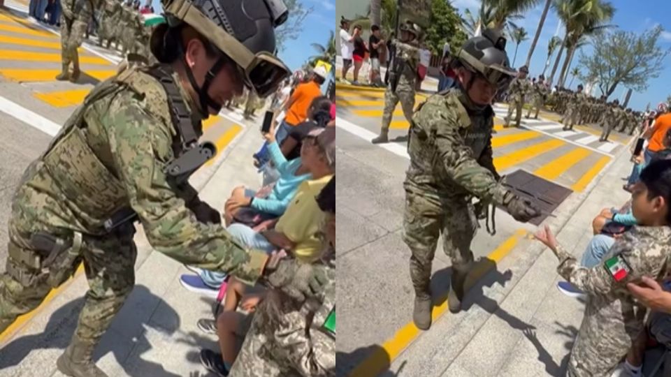 Marinos regalan parches a niño durante desfile de la Armada de México
