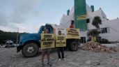 Foto ilustrativa de la nota titulada: Greenpeace protesta en Cancún: “No más Calicas”, acusan impunidad ambiental