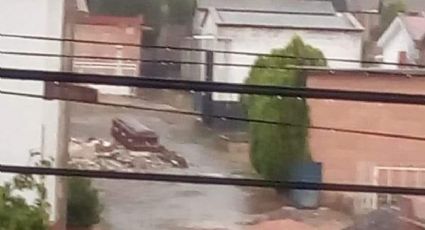 Tras intensa lluvia en Huichapan, corriente se lleva hasta un ataúd