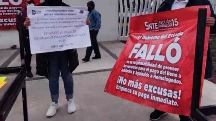 Maestros exigen pago de aguinaldo; acusan amenaza del SNTE para no manifestarse