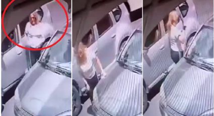 Sin aparente motivo, mujer rompe vidrios de un auto en Centro de Pachuca | VIDEO