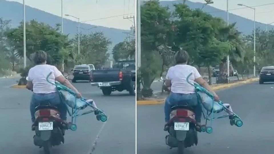 En un video que se viralizó se observa a una mujer que viaja sosteniendo la carriola con su bebé en medio de una vialidad transitada, en Michoacán