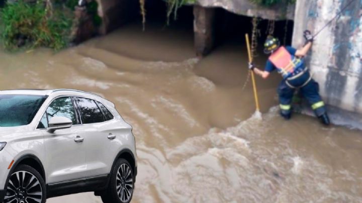 Conductor cae con todo y camioneta de medio millón de pesos a canal de aguas negras | FOTOS