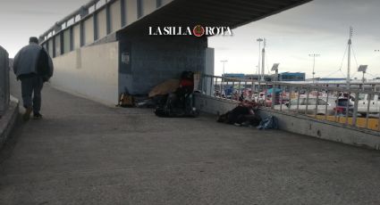 Tijuana-San Ysidro: puente peatonal, refugio de migrantes ante inclemencia del frío... y de Washington