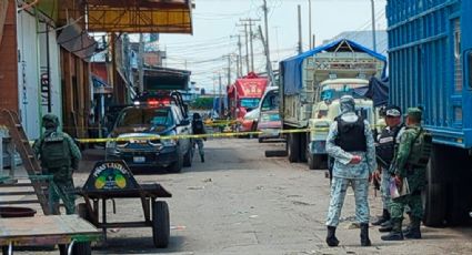 'Balean' a comerciante en su local de la Central de Abastos Celaya