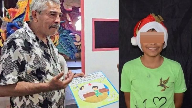 Diego y su padre, quien sostiene el dibujo con el que el menor ganó un concurso sobre la paz