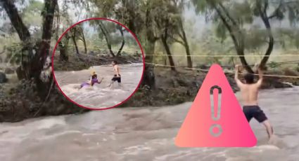 Con lazos, rescatan a pareja atrapada por la corriente del río en Huejutla I Video