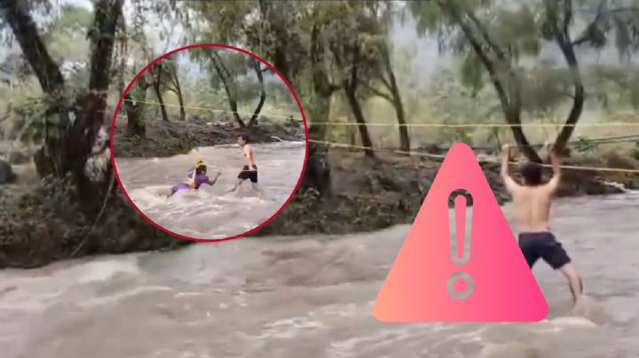 Con lazos, rescatan a pareja atrapada por la corriente del río en Huejutla I Video
