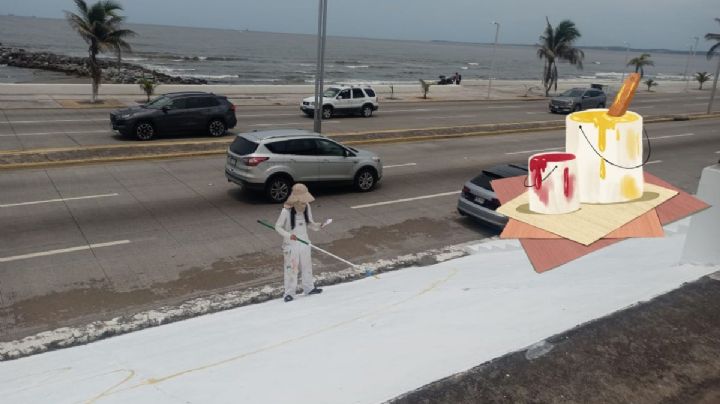 Mina y Zosen, muralistas extranjeros que pintan mural en Boca del Río