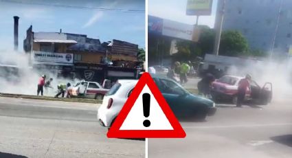 Rescatan a conductor tras connato de incendio de taxi en Veracruz