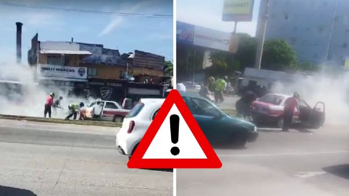 Rescatan a conductor tras connato de incendio de taxi en Veracruz