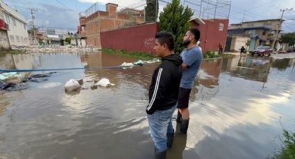 Vecinos se organizan en Chalco para luchar contra inundaciones