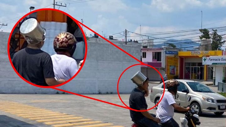 Solo en Hidalgo: joven motociclista usa olla como casco para evitar multas