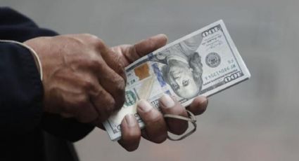 Presiona elección de EU al peso; cierra en 20.03 unidades por dólar