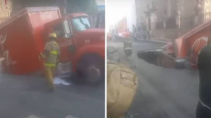 ¡Se abre la tierra! Socavón se traga auto con familia y camión de refrescos | VIDEO