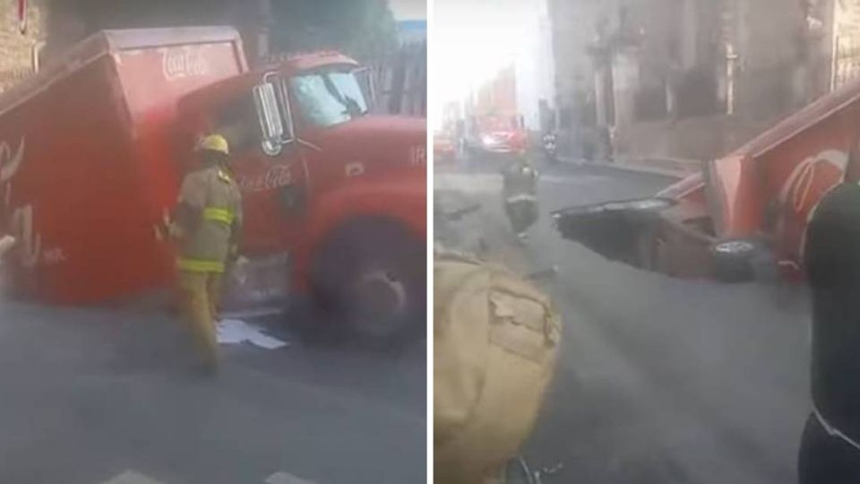 Al abrirse el socavón quedaron atrapados un camión de una refresquera y un auto.