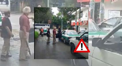 VIDEO: Con machete en mano, padre e hijo pelean contra taxista en Xalapa