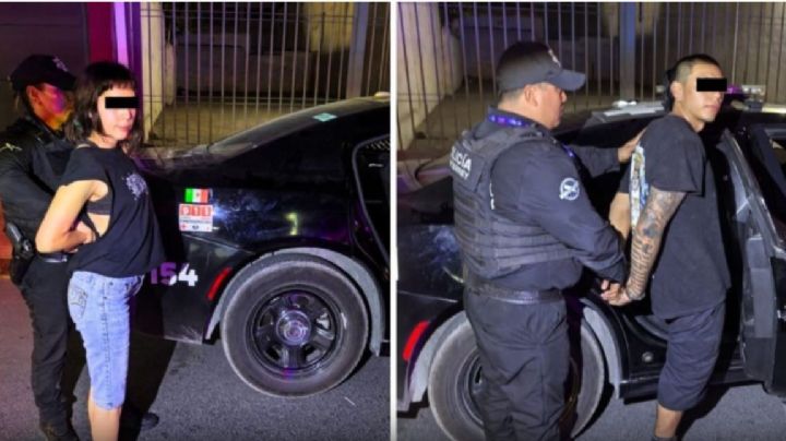 Detienen a pareja de jóvenes por grafitear una barda en el Centro de Monterrey