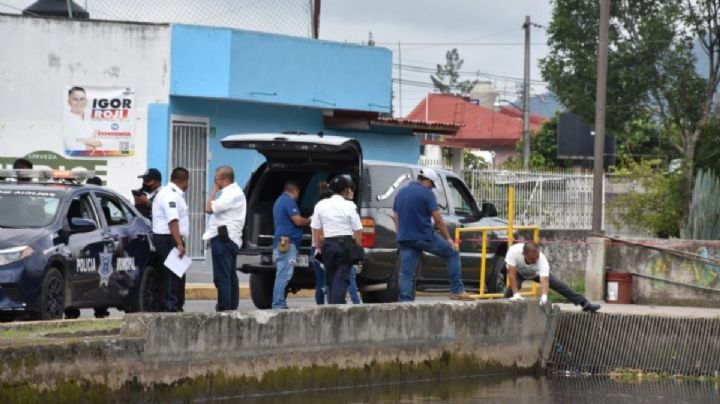 Hallan cuerpo en canal de Orizaba y desatan fuerte movilización policial