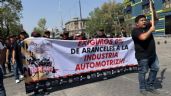Foto ilustrativa de la nota titulada Trabajadores automotrices exigen cancelación de aranceles de Trump en el Día del Trabajo