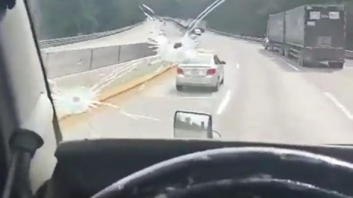 Trailero baleado libra asalto en la México-Puebla, pero GN lo multa tras pedir ayuda