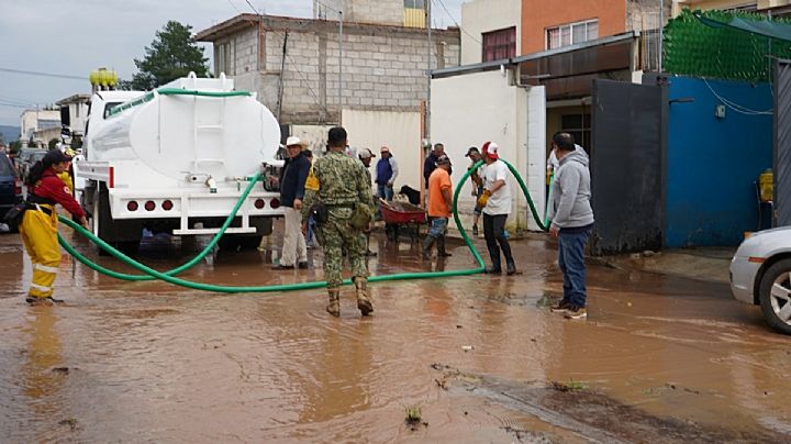 Gobierno de Tulantepec atiende daños en La Joya por desbordamiento de bordo