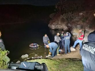 Mueren menores de edad ahogados en presa de San Agustín Tlaxiaca