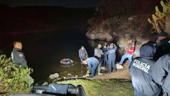 Mueren menores de edad ahogados en presa de San Agustín Tlaxiaca