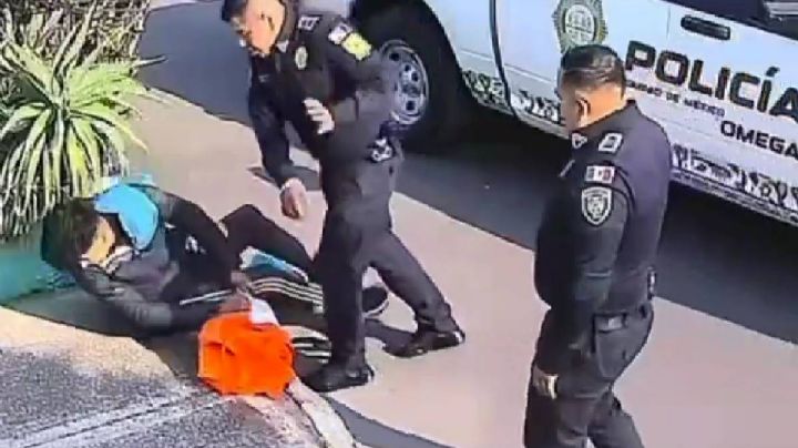 Policía golpea a jardinero que descansaba sobre una banqueta; será suspendido