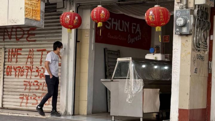 Chinos de León desconcertados por cierre de tiendas; "ojalá no prohíban la comida china"