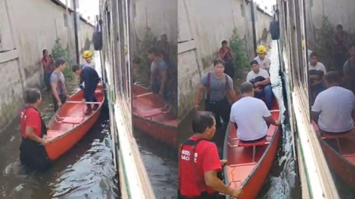 VIDEO: Con lancha, rescatan a pasajeros de camión varado en colonia de Veracruz tras lluvias